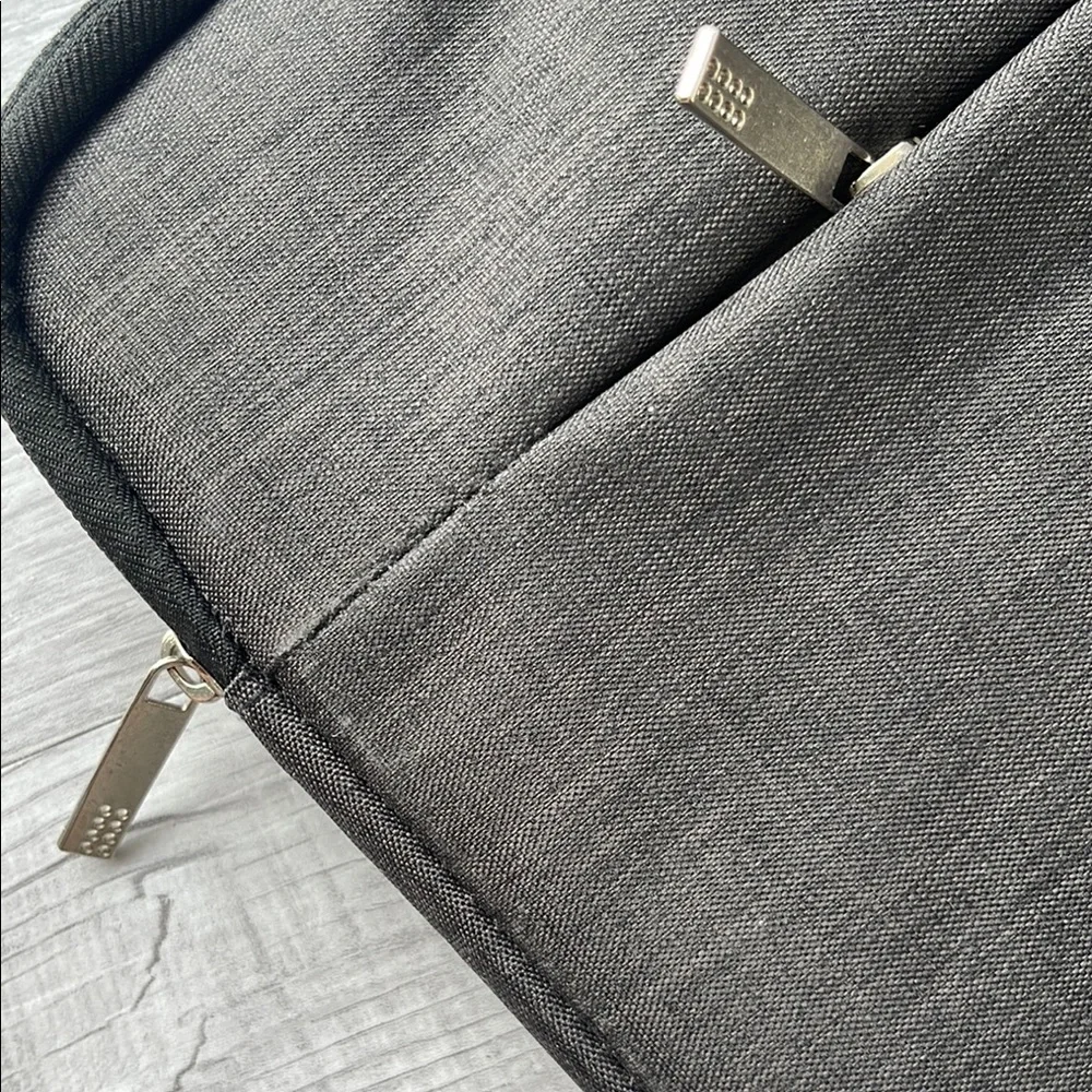 Sleek Gray Laptop Bag with Minimalist Design